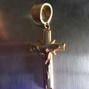 Stamped 14k gold crucifix pendant
